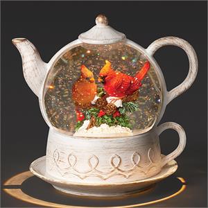Two cardinal tea pot snow globe